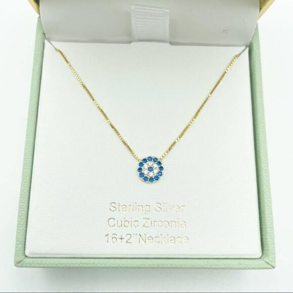 Tabitha Webb gold necklace with evil eye p…